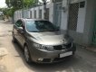 Kia Forte 2011 - Bán Kia Forte đời 2011, màu vàng cát