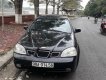 Daewoo Lacetti 2004 - Cần bán xe Daewoo Lacetti năm 2004, màu đen, giá 142tr