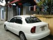 Daewoo Lanos SX 2001 - Cần bán Daewoo Lanos SX năm sản xuất 2001, màu trắng xe gia đình, 58 triệu