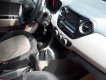 Hyundai Grand i10 2014 - Cần bán gấp Hyundai Grand i10 đời 2014, màu trắng, giá chỉ 255 triệu