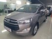 Toyota Innova 2.0E 2016 - Cần bán xe Toyota Innova 2.0E năm sản xuất 2016, màu xám xe gia đình