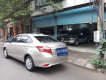 Toyota Vios E 1.5AT 2016 - Bán Toyota Vios E 1.5AT năm 2016 vàng nâu