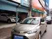 Toyota Vios E 1.5AT 2016 - Bán Toyota Vios E 1.5AT năm 2016 vàng nâu