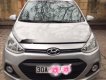 Hyundai Grand i10 E có con  chính chủ 2015 - Bán xe Hyundai Grand i10 E có con  chính chủ năm 2015, màu bạc