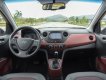 Hyundai Grand i10 1.2 AT 2018 - Bán xe Hyundai Grand i10 đời 2018, màu trắng, nhập khẩu nguyên chiếc, giá tốt