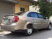 Daewoo Lacetti 2004 - Chính chủ bán Daewoo Lacetti sản xuất năm 2004, màu vàng