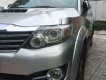 Toyota Fortuner 2015 - Cần bán lại xe Toyota Fortuner đời 2015, màu bạc xe gia đình