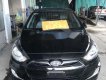 Hyundai Accent 2012 - Bán ô tô Hyundai Accent sản xuất 2012, màu đen số tự động, giá 385tr