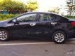 Kia Rio 1.4 AT 2015 - Bán Kia Rio 1.4 AT 2015, màu đen, xe nhập chính chủ