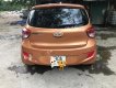 Hyundai Grand i10 2015 - Bán Hyundai Grand i10 năm sản xuất 2015, màu đồng