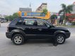 Hyundai Tucson  2.0AT  2009 - Bán Hyundai Tucson 2.0AT đời 2009, màu đen, xe nhập