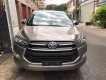 Toyota Innova   E 2016 - Cần bán Toyota Innova E năm 2016, màu nâu xe gia đình