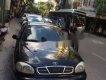 Daewoo Lanos 2001 - Cần bán gấp Daewoo Lanos năm sản xuất 2001, màu đen