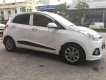 Hyundai Grand i10 1.0AT 2015 - Cần bán xe Hyundai Grand i10 1.0AT đời 2015, màu trắng