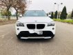 BMW X1 2011 - Bán xe BMW X1 đời 2011, màu trắng