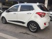 Hyundai Grand i10 1.0AT 2015 - Cần bán xe Hyundai Grand i10 1.0AT đời 2015, màu trắng