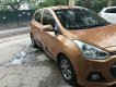 Hyundai Grand i10 2015 - Bán Hyundai Grand i10 năm sản xuất 2015, màu đồng