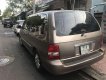 Kia Carnival 2009 - Cần bán lại xe Kia Carnival 2009, màu nâu