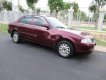 Ford Laser 2000 - Cần bán Ford Laser đời 2000, màu đỏ, 156 triệu