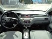 Mitsubishi Lancer AT 2005 - Bán ô tô Mitsubishi Lancer AT năm 2005, màu bạc, xe còn đẹp