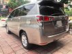 Toyota Innova 2.0E 2016 - Cần bán lại xe Toyota Innova 2.0E sản xuất năm 2016, màu nâu số sàn