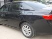 Toyota Corolla XLi 1.6 2009 - Cần bán xe Toyota Corolla XLi 1.6 năm sản xuất 2009, màu đen, xe nhập 