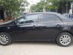 Toyota Corolla XLi 1.6 2009 - Cần bán xe Toyota Corolla XLi 1.6 năm sản xuất 2009, màu đen, xe nhập 