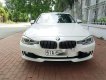 BMW 3 Series  320i 2013 - Bán ô tô BMW 3 Series 320i đời 2013, màu trắng, nhập khẩu nguyên chiếc chính chủ, giá chỉ 915 triệu