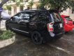 Kia Carens   EX 2010 - Bán xe Kia Carens EX 2010, màu đen  