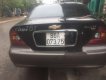 Daewoo Magnus 2004 - Bán ô tô Daewoo Magnus năm 2004, màu đen  