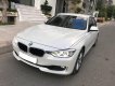 BMW 3 Series  320i  2013 - Cần bán lại xe BMW 3 Series 320i sản xuất 2013, màu trắng, giá tốt