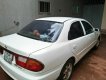 Mazda 1200 1997 - Cần bán Mazda 1200 năm 1997, màu trắng, nhập khẩu nguyên chiếc