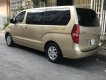 Hyundai Grand Starex   2011 - Bán xe Hyundai Grand Starex năm sản xuất 2011, màu vàng 