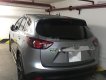 Mazda CX 5 AWD 2014 - Cần bán gấp Mazda CX5, phiên bản 2.0AT, đời 2014 đã đi 53.000km