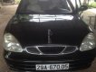 Daewoo Nubira E 2002 - Cần bán Daewoo Nubira E đời 2002, màu đen, giá chỉ 90 triệu
