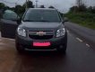 Chevrolet Orlando 2012 - Cần bán gấp Chevrolet Orlando sản xuất năm 2012, màu bạc còn mới, giá 410tr