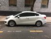 Kia Rio 1.4 AT 2015 - Cần bán xe Kia Rio 1.4 AT đời 2015, màu trắng, nhập khẩu chính hãng xe siêu lướt