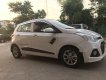 Hyundai Grand i10 2015 - Cần bán xe Hyundai Grand i10 sản xuất 2015, màu trắng, nhập khẩu nguyên chiếc chính chủ