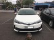 Toyota Corolla altis E CVT 2018 - Cần bán gấp Toyota Corolla Altis E CVT đời 2018, màu trắng số tự động, giá 725tr