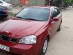 Daewoo Lacetti 2006 - Cần bán gấp Daewoo Lacetti năm sản xuất 2006, màu đỏ