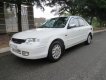 Ford Laser   2000 - Cần bán Ford Laser sản xuất 2000, màu trắng, 165 triệu 