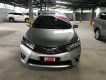 Toyota Corolla altis 1.8G MT 2015 - Cần bán xe Toyota Corolla altis 1.8G MT đời 2015, màu bạc