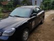 Daewoo Nubira    2004 - Cần bán gấp Daewoo Nubira đời 2004, màu đen, giá tốt