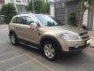 Chevrolet Captiva MAXX LT   2009 - Gia đình cần bán xe Captiva 2009 bản LT, số sàn, màu vàng cát