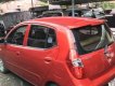 Hyundai i10    2012 - Bán Hyundai i10 sản xuất 2012, màu đỏ, xe gia đình sử dụng, ít đi còn mới