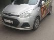 Hyundai Grand i10 2016 - Cần bán gấp Hyundai Grand i10 sản xuất năm 2016, màu bạc giá cạnh tranh