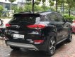 Hyundai Tucson 1.6 Turbo  2016 - Bán Hyundai Tucson 1.6 Turbo năm 2016, màu đen, giá 940tr