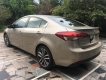 Kia Cerato AT 2016 - Cần bán Kia Cerato AT sản xuất 2016, màu nâu 