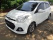 Hyundai Grand i10 2015 - Cần bán lại xe Hyundai Grand i10 2015, màu trắng  