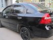 Daewoo Gentra 2011 - Cần bán lại xe Daewoo Gentra sản xuất 2011, màu đen xe gia đình, giá chỉ 178 triệu